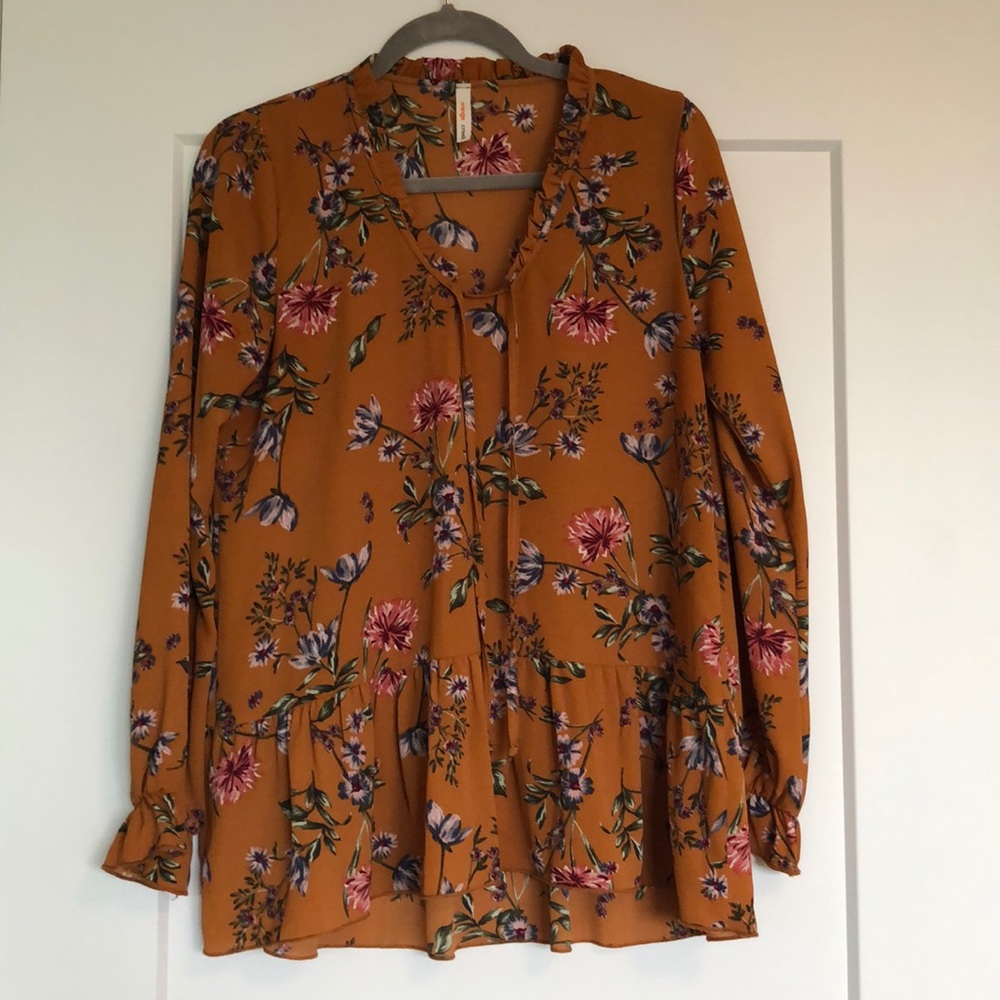 Orange floral blouse